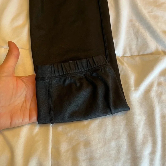 Lululemon black joggers with drawstring elastic waist band, and hemline.  Size 4 - Picture 10 of 13